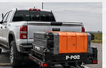P-POD-ийг ачааны машины ард ачиж тээвэрлэж буй байдал